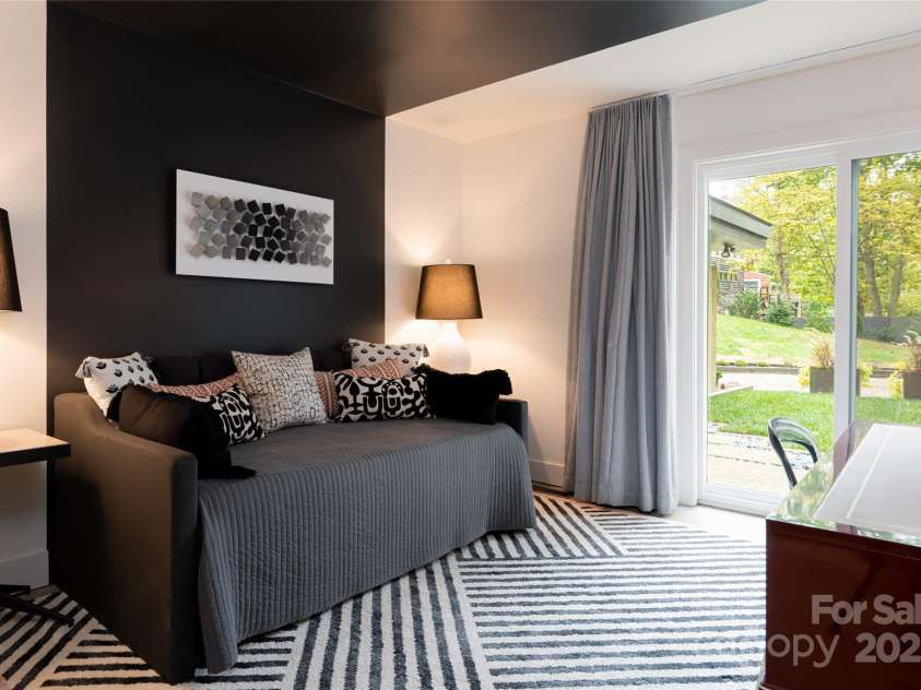 46 Dortch Avenue, Asheville, NC 28801.  MLS# CAR4146963, YatesRealty ID 16353. Third bedroom with access to covered patio