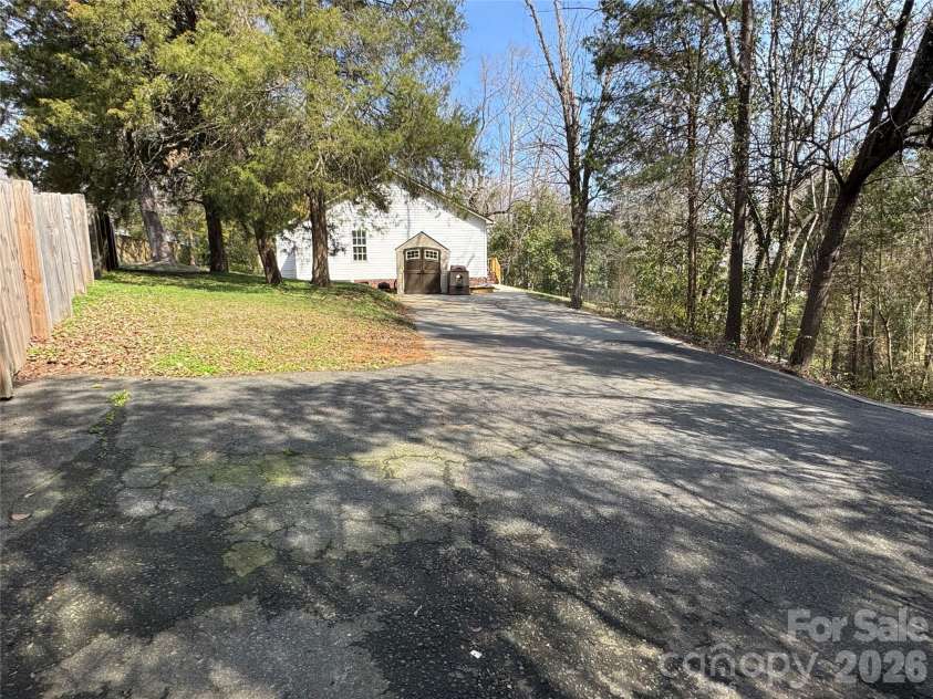 345 Dellwood Court, Concord, NC 28025.  MLS# CAR4368785, YatesRealty ID 16358. Parking spaces and side yard