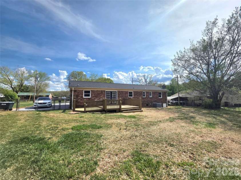 104 Lou Drive, Gastonia, NC 28052.  MLS# CAR4364630, YatesRealty ID 16360. Nice deck area