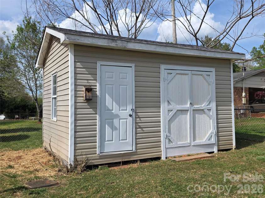 104 Lou Drive, Gastonia, NC 28052.  MLS# CAR4364630, YatesRealty ID 16360. Nice storage building