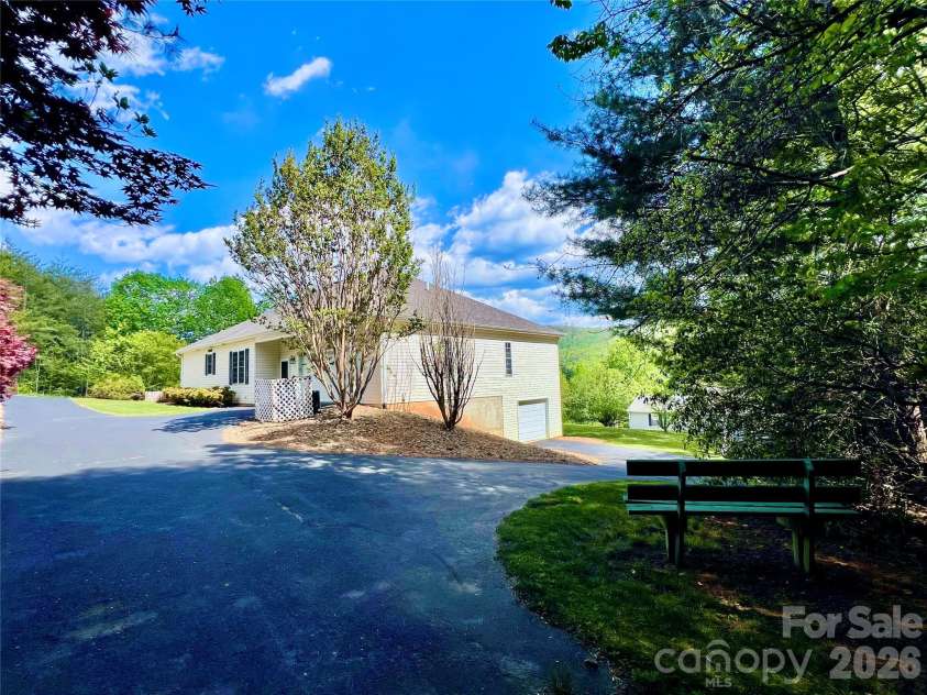 7 Curtis Drive, Hendersonville, NC 28739.  MLS# CAR4372941, YatesRealty ID 16361. Beautiful Lot with Ample Parking & Storage