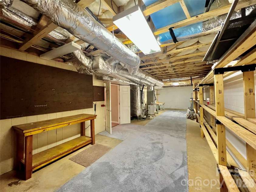 7 Curtis Drive, Hendersonville, NC 28739.  MLS# CAR4372941, YatesRealty ID 16361. Excellent Storage Space or Workshop