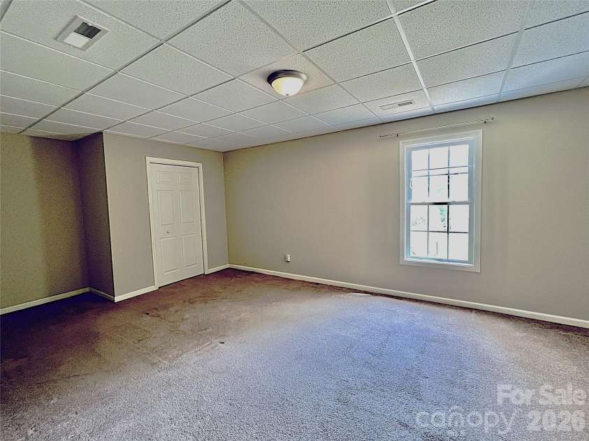 7 Curtis Drive, Hendersonville, NC 28739.  MLS# CAR4372941, YatesRealty ID 16361. Lower-Level Bonus Room with Closet