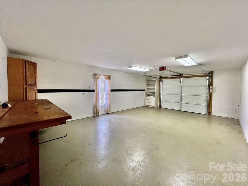 7 Curtis Drive, Hendersonville, NC 28739.  MLS# CAR4372941, YatesRealty ID 16361. One Car Garage