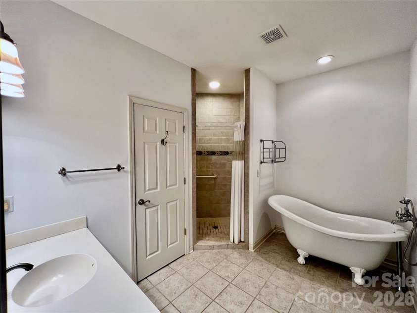 7 Curtis Drive, Hendersonville, NC 28739.  MLS# CAR4372941, YatesRealty ID 16361. Primary Bathroom