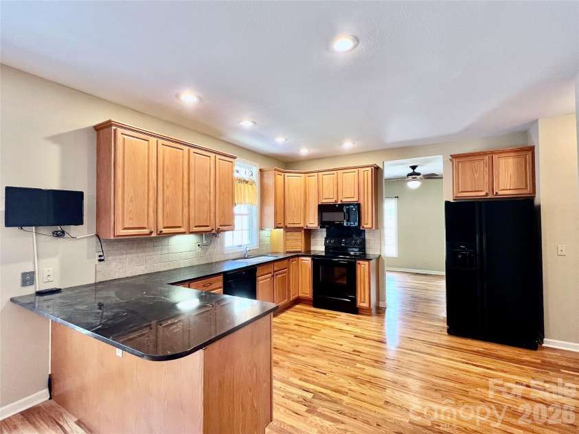 7 Curtis Drive, Hendersonville, NC 28739.  MLS# CAR4372941, YatesRealty ID 16361. Space for Bar Stools