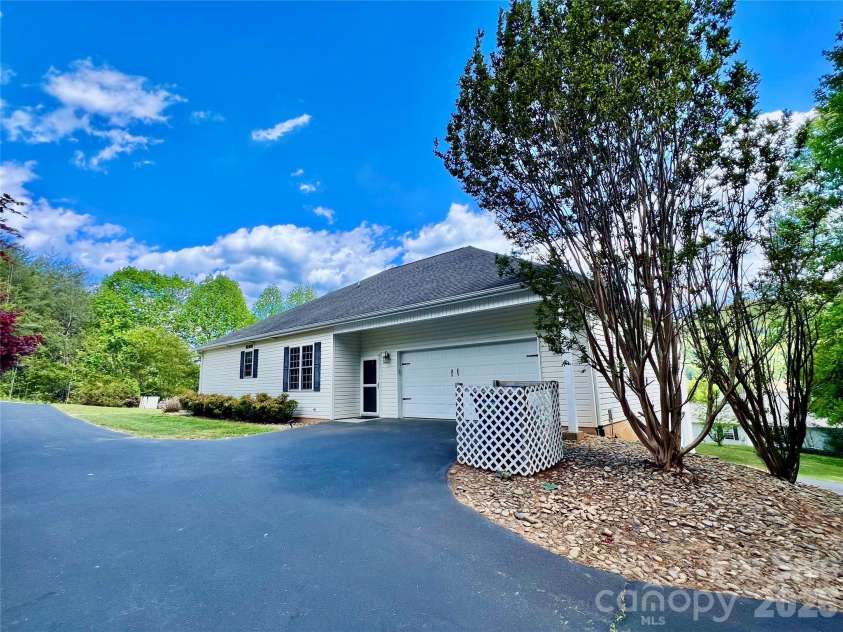7 Curtis Drive, Hendersonville, NC 28739.  MLS# CAR4372941, YatesRealty ID 16361. Two Car Garage on Main Level