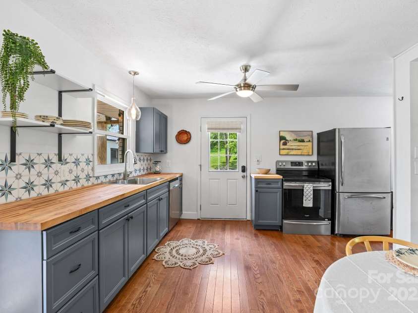 9 Mikayla Lane, Candler, NC 28715.  MLS# CAR4242075, YatesRealty ID 16364. Access to turn around driveway/patio for ease coming in with groceries