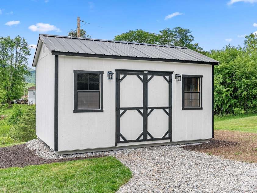 9 Mikayla Lane, Candler, NC 28715.  MLS# CAR4242075, YatesRealty ID 16364. Chickens, goats, riding mower?