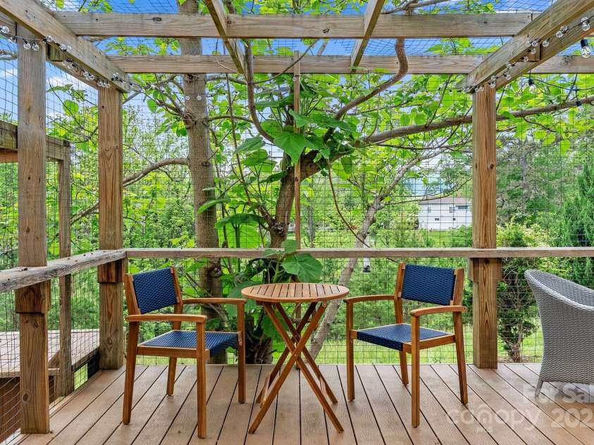 9 Mikayla Lane, Candler, NC 28715.  MLS# CAR4242075, YatesRealty ID 16364. Dining al fresco