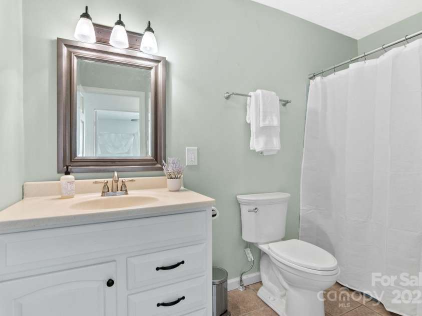 9 Mikayla Lane, Candler, NC 28715.  MLS# CAR4242075, YatesRealty ID 16364. First full bath