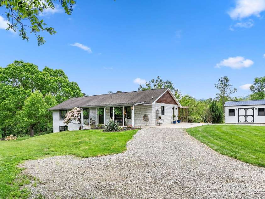 9 Mikayla Lane, Candler, NC 28715.  MLS# CAR4242075, YatesRealty ID 16364. Flat driveway with turn around and fresh gravel