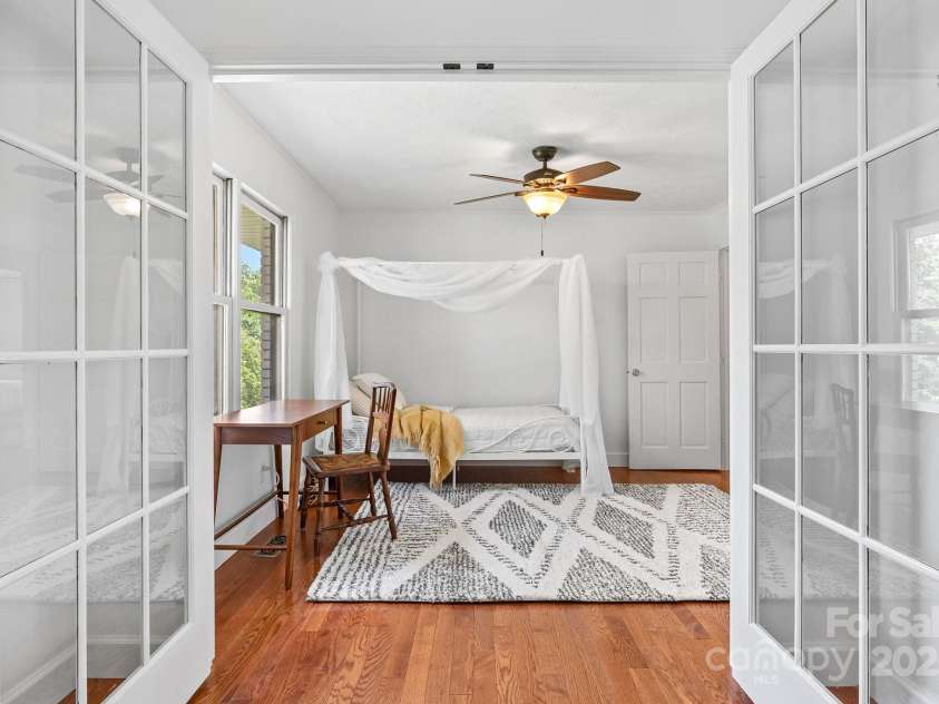 9 Mikayla Lane, Candler, NC 28715.  MLS# CAR4242075, YatesRealty ID 16364. French doors make this 3rd bedroom versatile: bedroom, office, library, playroom, studio?