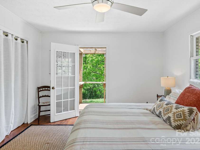 9 Mikayla Lane, Candler, NC 28715.  MLS# CAR4242075, YatesRealty ID 16364. Private deck access from primary ensuite