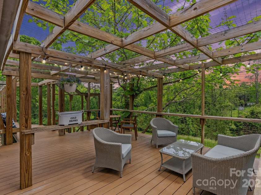 9 Mikayla Lane, Candler, NC 28715.  MLS# CAR4242075, YatesRealty ID 16364. Sweet, private space for relaxing and entertaining