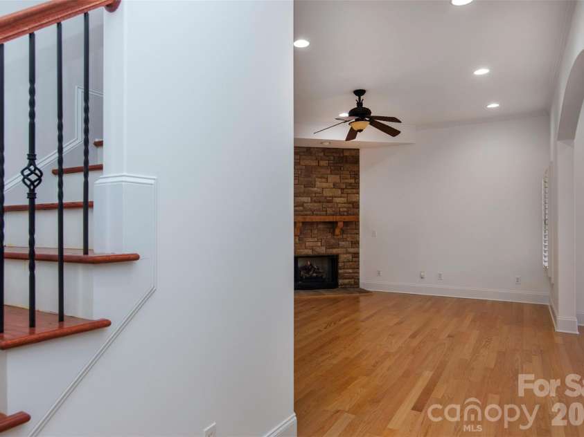 4709 Trey View Court, Mint Hill, NC 28227.  MLS# CAR4173427, YatesRealty ID 16368. Hardwood staiirs/iron balusters to finished basement-10 ft ceilings, engineered wood flooring,stone fireplace,arched openings,flex room, BR 4,hall FBath, dbl French doors to private entry/patio
