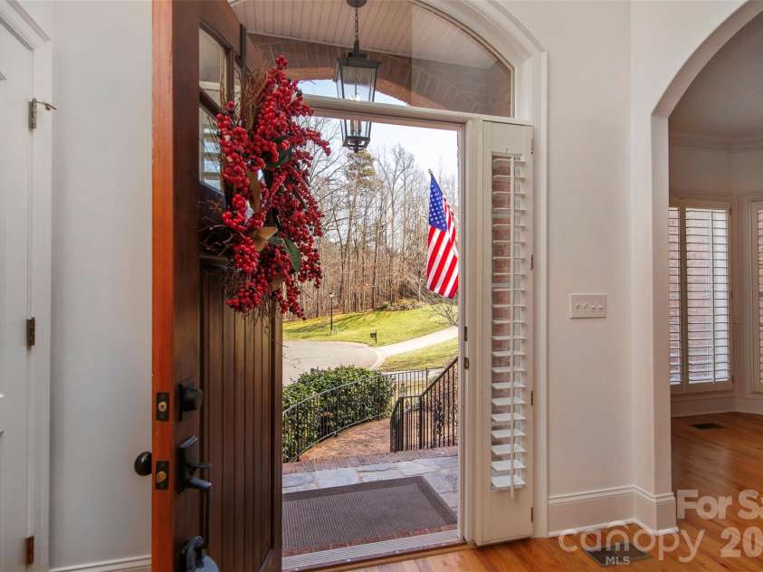 4709 Trey View Court, Mint Hill, NC 28227.  MLS# CAR4173427, YatesRealty ID 16368. Impressive view from front door - year round view of trees!  Welcome family/friends to your well built custom 
