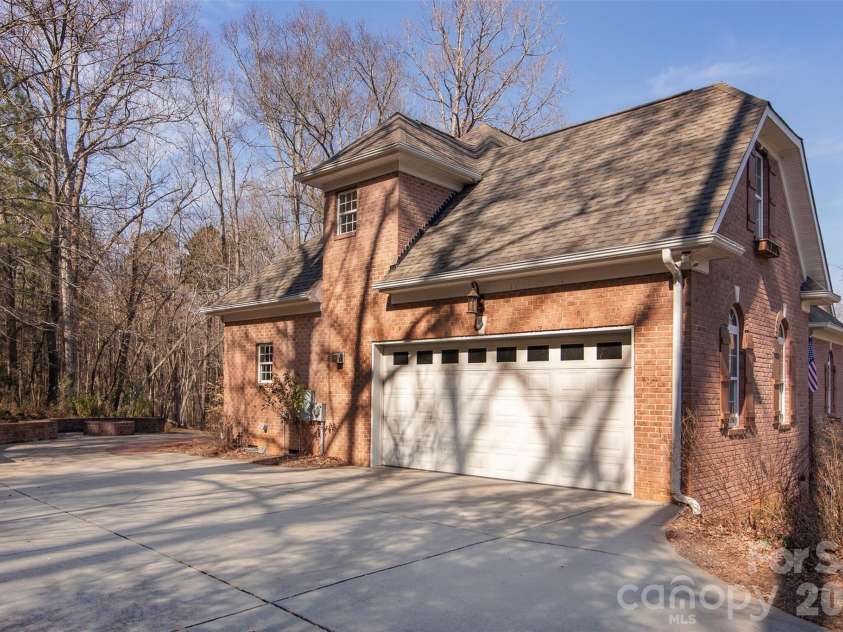 4709 Trey View Court, Mint Hill, NC 28227.  MLS# CAR4173427, YatesRealty ID 16368. Large parking pad - 18 ft garage door -with Mint Hill and HOA Architectural approval, lot may allow detached garage.