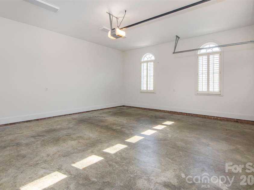 4709 Trey View Court, Mint Hill, NC 28227.  MLS# CAR4173427, YatesRealty ID 16368. Oversized gar - gas water heater in garage, exterior keypad, 18' door,  brick steps to laundry/mud room!