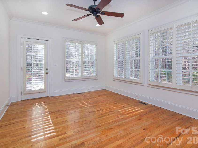 4709 Trey View Court, Mint Hill, NC 28227.  MLS# CAR4173427, YatesRealty ID 16368. Sunroom/fantastic dining room - two entries for flow from dining to outside brick/concrete patio/firepit or to 29 ft deck - great for casual entertaining!