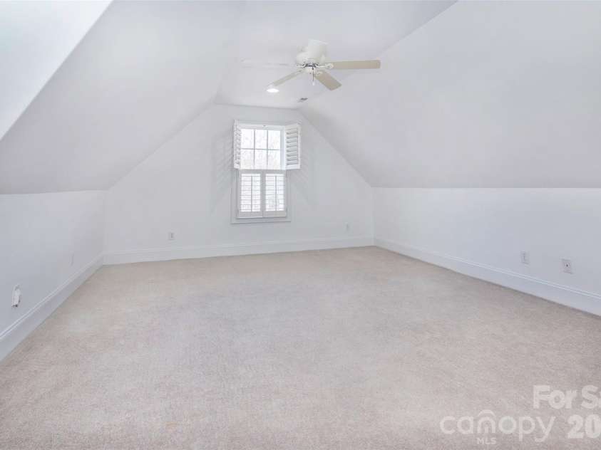 4709 Trey View Court, Mint Hill, NC 28227.  MLS# CAR4173427, YatesRealty ID 16368. Upstairs large bonus room conveniently located by the two upstairs bedrooms - also has hardwood entry off hall - great for children playroom or relaxing room for guests! 