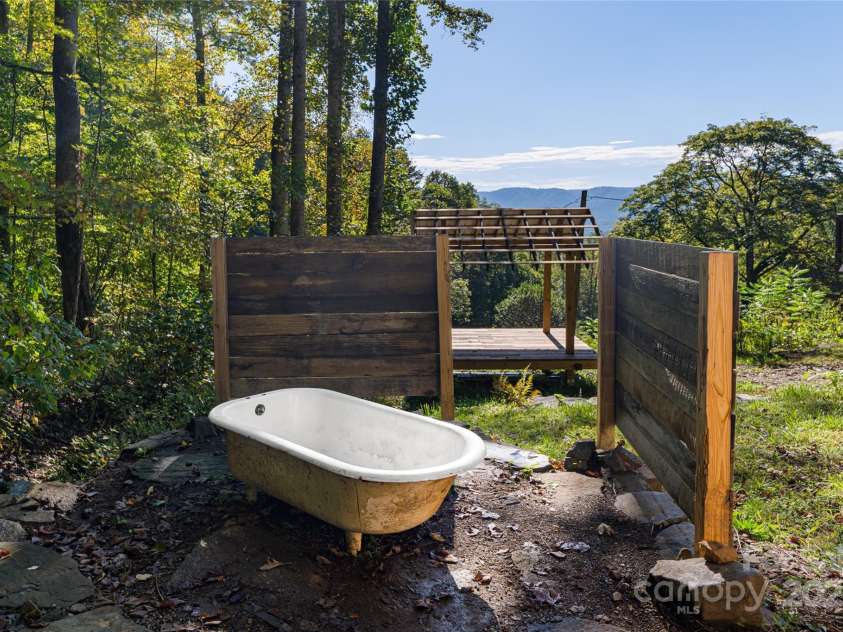 360 Banjo Branch Road, Burnsville, NC 28714.  MLS# CAR4310323, YatesRealty ID 1637. A bathing nook is possible next to the home.