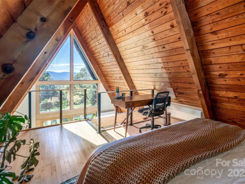 360 Banjo Branch Road, Burnsville, NC 28714.  MLS# CAR4310323, YatesRealty ID 1637. Mountain Views from the bedroom 