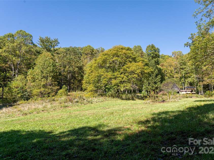 360 Banjo Branch Road, Burnsville, NC 28714.  MLS# CAR4310323, YatesRealty ID 1637. Open fields provide unlimited options for the property. 