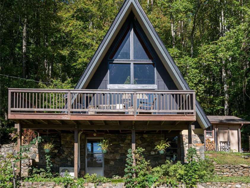 360 Banjo Branch Road, Burnsville, NC 28714.  MLS# CAR4310323, YatesRealty ID 1637. The A-Frame has a full un-finshed basement perfect for storage or could be finished in. 