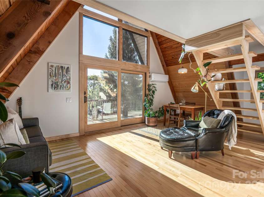 360 Banjo Branch Road, Burnsville, NC 28714.  MLS# CAR4310323, YatesRealty ID 1637. The home is an open floor plan with ample natural light