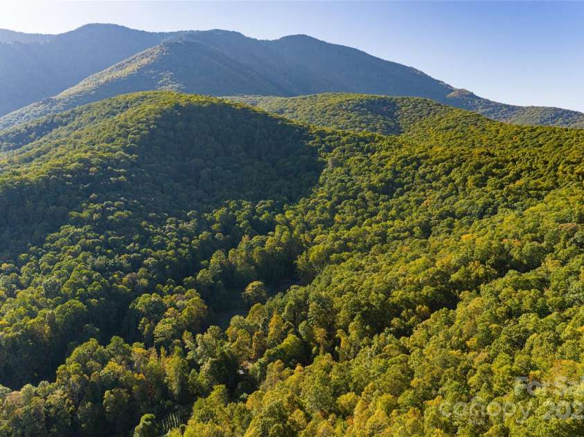 360 Banjo Branch Road, Burnsville, NC 28714.  MLS# CAR4310323, YatesRealty ID 1637. The property is located at the foot of the Black Mountains and Mount Celo. 