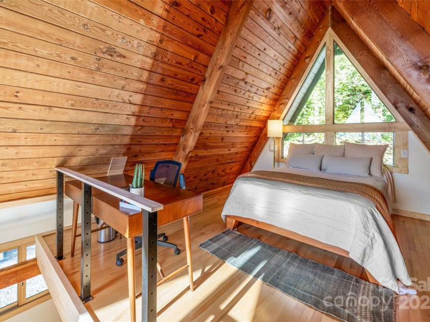 360 Banjo Branch Road, Burnsville, NC 28714.  MLS# CAR4310323, YatesRealty ID 1637. The upstairs bedroom 