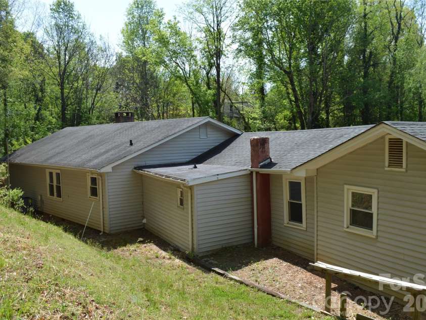 191 Flat Rock Hill Road, Tryon, NC 28782.  MLS# CAR4374519, YatesRealty ID 16376. 