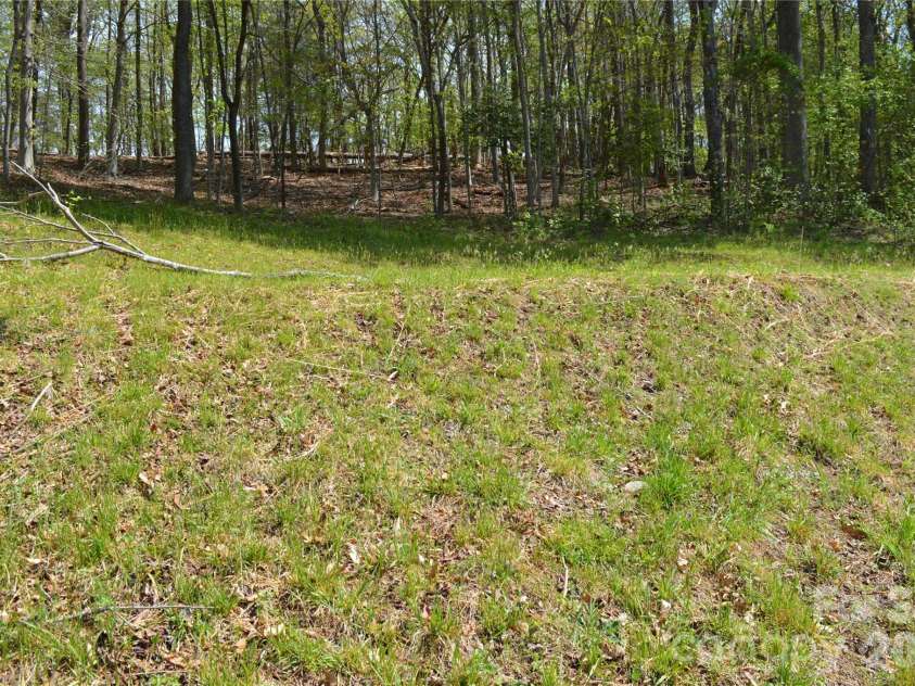 191 Flat Rock Hill Road, Tryon, NC 28782.  MLS# CAR4374519, YatesRealty ID 16376. 