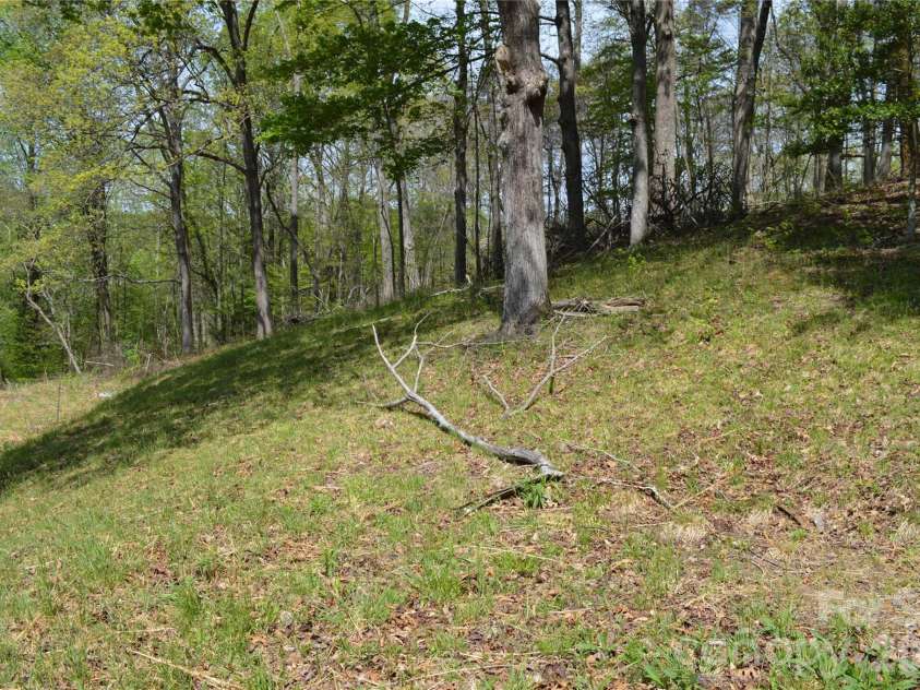 191 Flat Rock Hill Road, Tryon, NC 28782.  MLS# CAR4374519, YatesRealty ID 16376. 