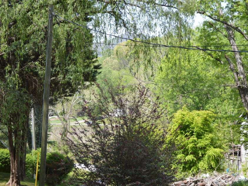 191 Flat Rock Hill Road, Tryon, NC 28782.  MLS# CAR4374519, YatesRealty ID 16376. 