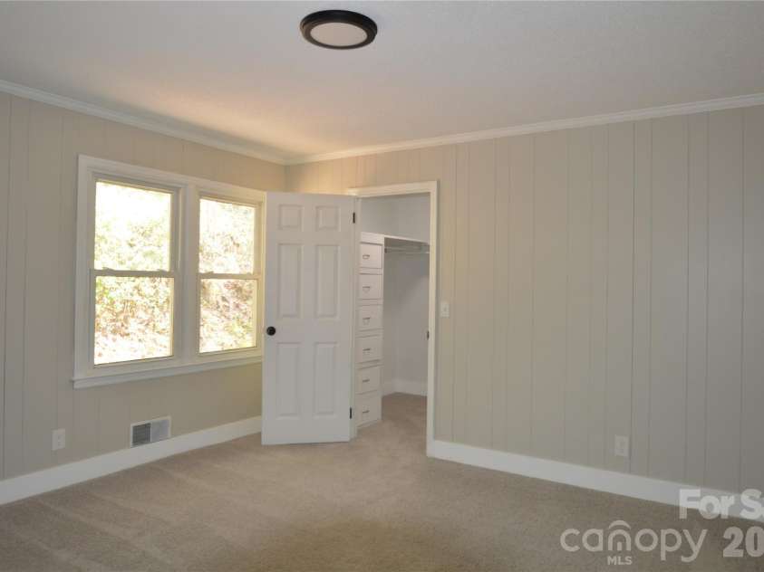 191 Flat Rock Hill Road, Tryon, NC 28782.  MLS# CAR4374519, YatesRealty ID 16376. 