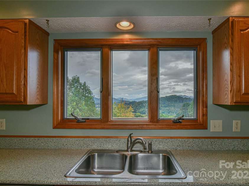 520 Trials Gap Drive, Waynesville, NC 28786.  MLS# CAR4288659, YatesRealty ID 1638. Kitchen View