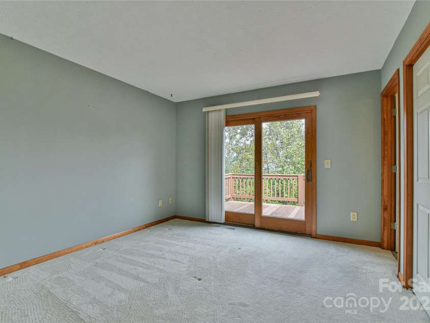 520 Trials Gap Drive, Waynesville, NC 28786.  MLS# CAR4288659, YatesRealty ID 1638. Primary Bedroom