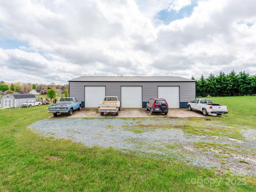 514 Baucom Deese Road, Monroe, NC 28110.  MLS# CAR4240849, YatesRealty ID 16384. New Gravel Has Been Put Down Leading to Shop Since the Photos Were Taken