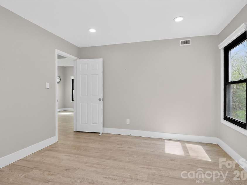 27070 Catamaran Drive, Tega Cay, SC 29708.  MLS# CAR4363313, YatesRealty ID 16385. Main Level Bedroom