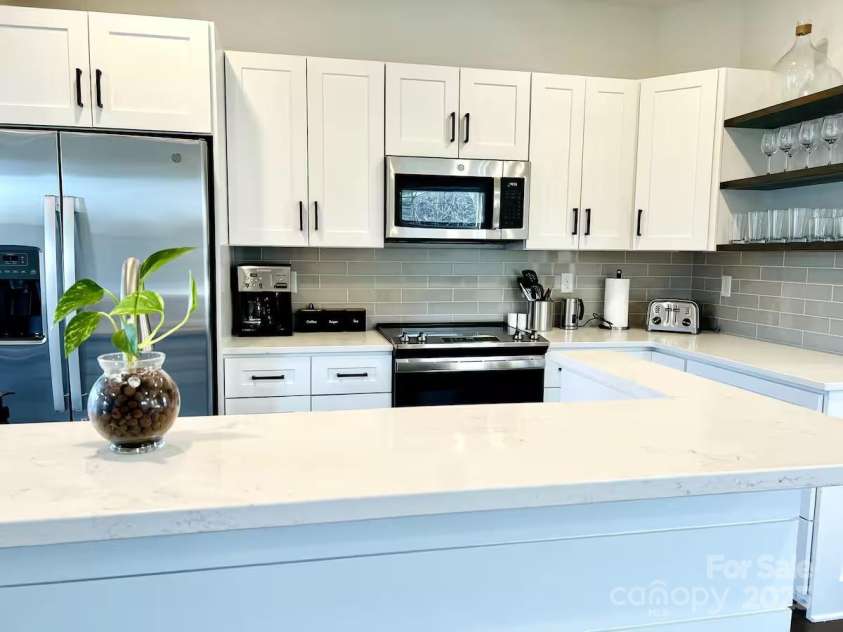 1057 Riverside Drive, Asheville, NC 28804.  MLS# CAR4330741, YatesRealty ID 1639. 