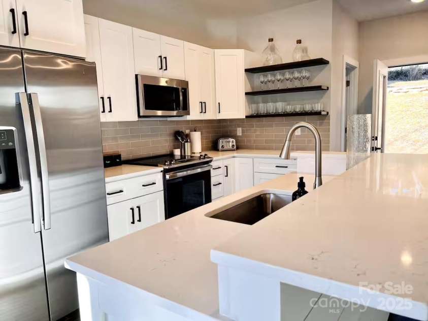 1057 Riverside Drive, Asheville, NC 28804.  MLS# CAR4330741, YatesRealty ID 1639. 