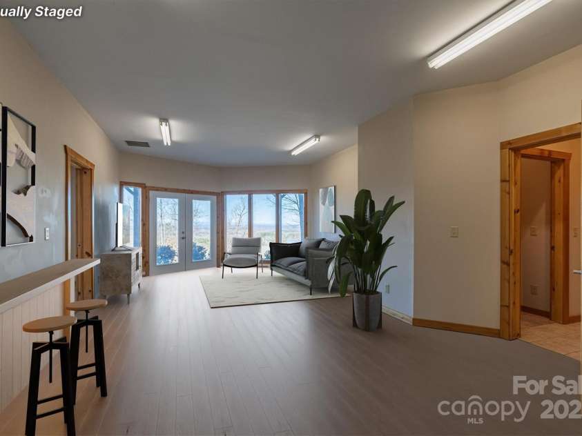 2262 Grandview Peaks Drive, Nebo, NC 28761.  MLS# CAR4230510, YatesRealty ID 1639. Basement Den w/ Virtual Staging