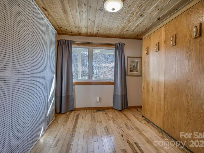 2262 Grandview Peaks Drive, Nebo, NC 28761.  MLS# CAR4230510, YatesRealty ID 1639. Guest Bedroom w/ Murphy Bed