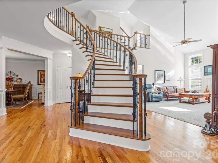 388 Cove Creek Loop, Mooresville, NC 28117.  MLS# CAR4304115, YatesRealty ID 16390. Dramatic Circular Staircase