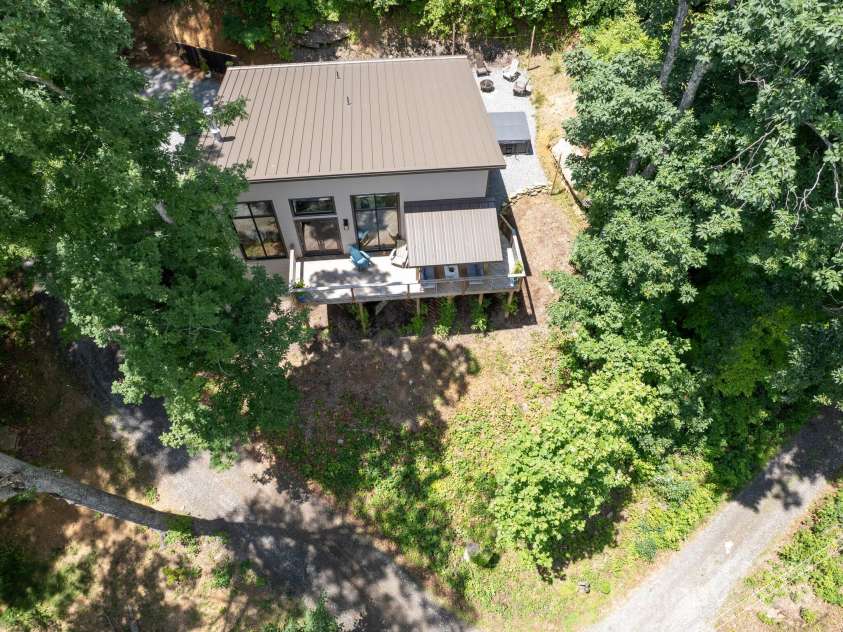 43 Tinkling Springs Lane, Fairview, NC 28730.  MLS# CAR4159981, YatesRealty ID 16392. Aerial View of Home and Private Setting