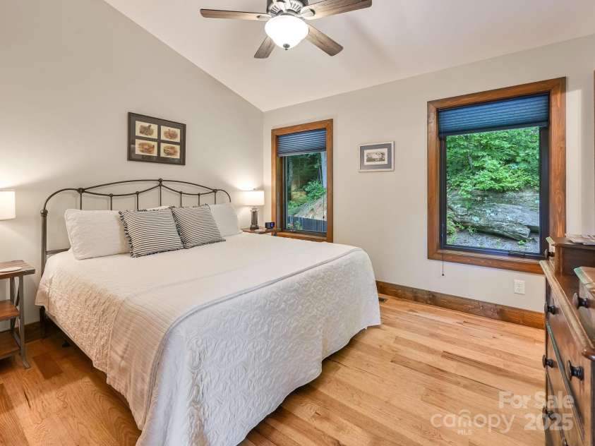 43 Tinkling Springs Lane, Fairview, NC 28730.  MLS# CAR4159981, YatesRealty ID 16392. Guest Bedroom Surrounded By Nature