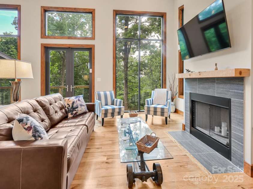 43 Tinkling Springs Lane, Fairview, NC 28730.  MLS# CAR4159981, YatesRealty ID 16392. Living Room to Deck