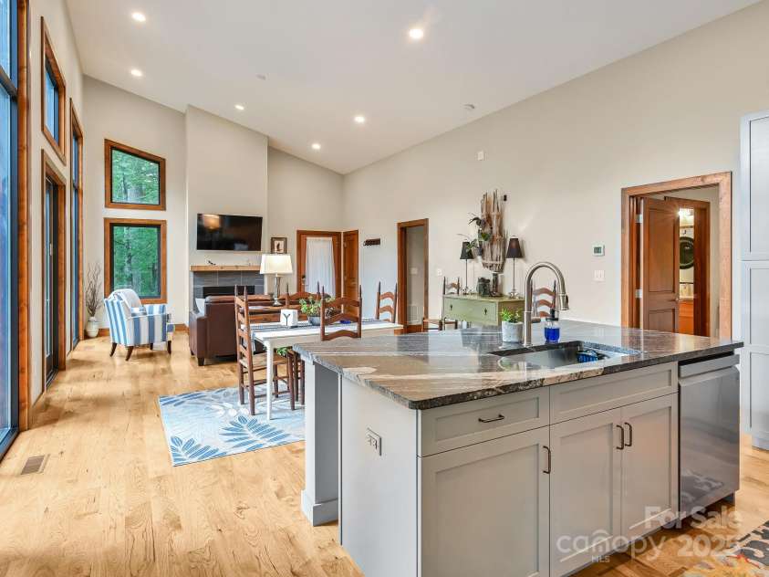 43 Tinkling Springs Lane, Fairview, NC 28730.  MLS# CAR4159981, YatesRealty ID 16392. Open Kitchen, Living and Dining with Amazing Light